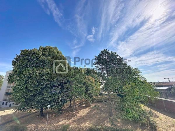 APPARTEMENT F4 TRAVERSANT AVEC BALCON, BOX ET CAVE