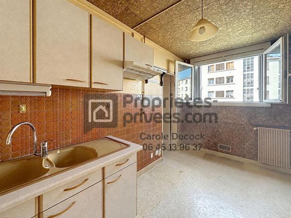 APPARTEMENT F4 TRAVERSANT AVEC BALCON, BOX ET CAVE