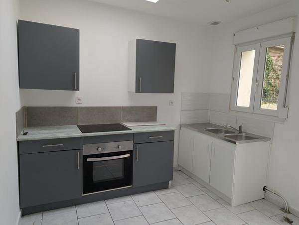 Petite maison de ville à Bruay La Buissière - Prix attractif