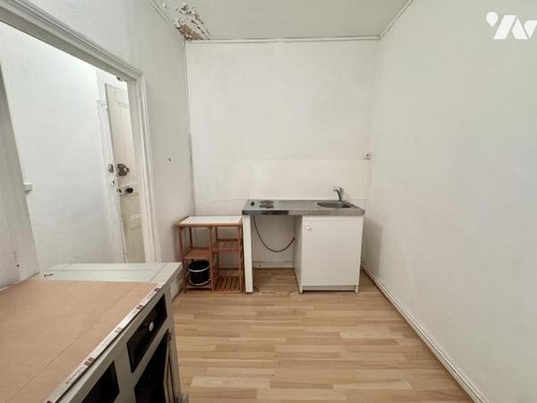 Centre-ville de Savenay – Immeuble avec local commercial, 2 appartements et garage