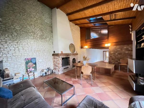 Maison 8 pièces  218 m²