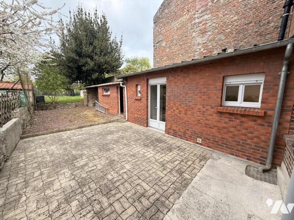 Maison semi mitoyenne avec jardin