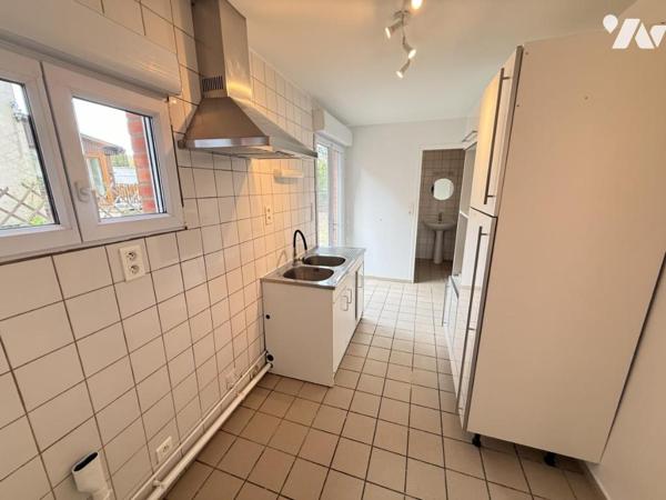 Maison semi mitoyenne avec jardin