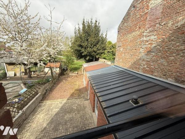 Maison semi mitoyenne avec jardin