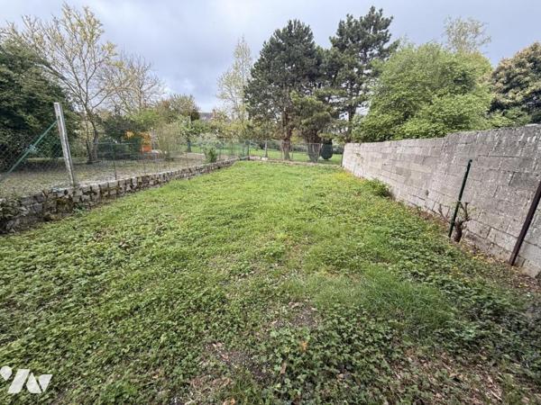 Maison semi mitoyenne avec jardin