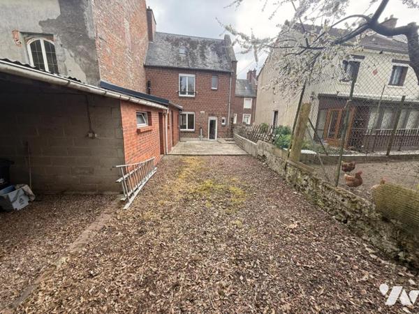 Maison semi mitoyenne avec jardin