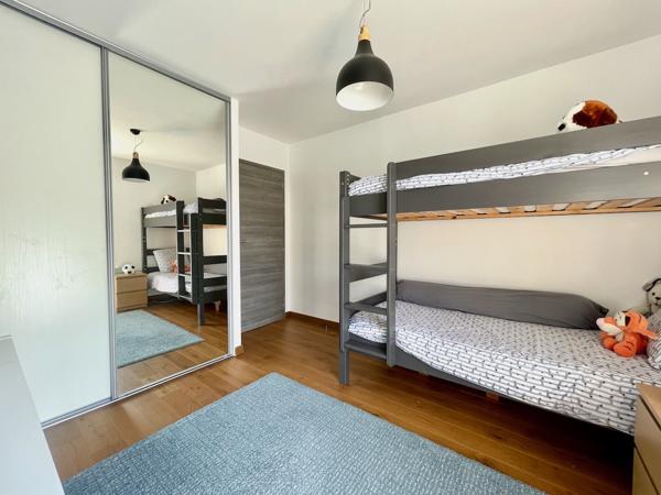 Divonne-les-Bains (01220) APPARTEMENT 3 CHAMBRES - GRANDES TERRASSES - GARAGE DOUBLE ET CAVE