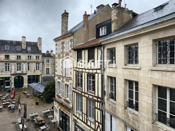 Immeuble de rapport avec local commercial + cave