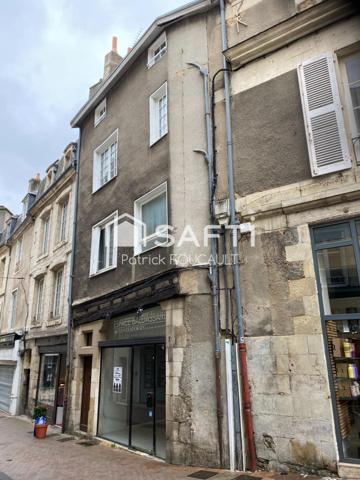 Immeuble de rapport avec local commercial + cave