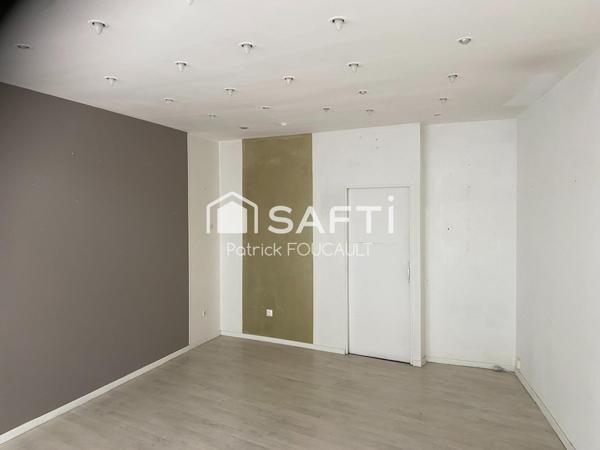 Immeuble de rapport avec local commercial + cave