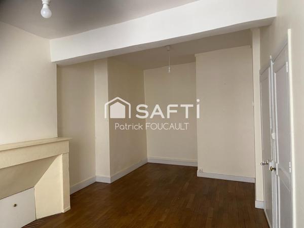 Immeuble de rapport avec local commercial + cave