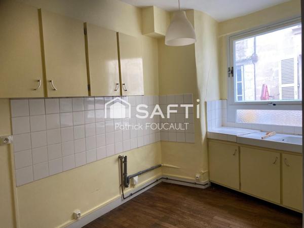 Immeuble de rapport avec local commercial + cave