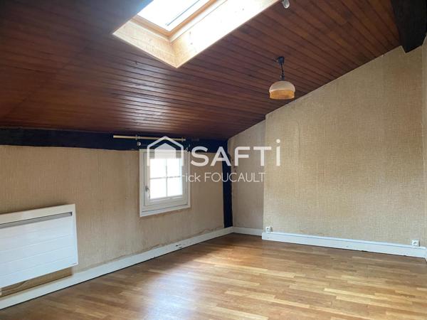 Immeuble de rapport avec local commercial + cave