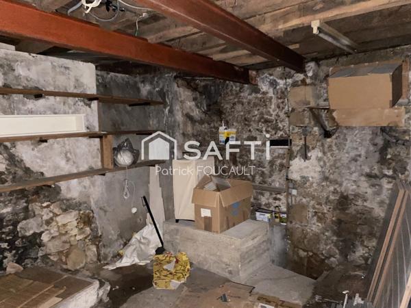 Immeuble de rapport avec local commercial + cave