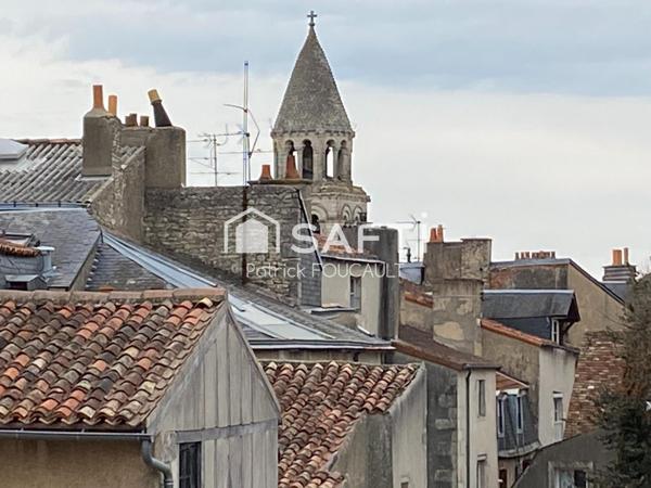 Immeuble de rapport avec local commercial + cave