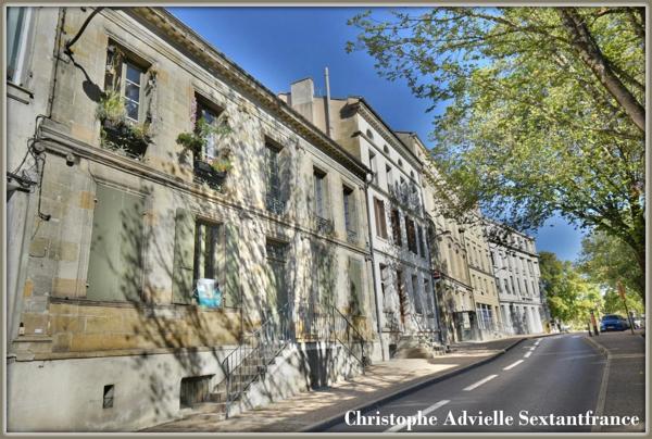 Immeuble de rapport rénové en coeur de ville, mixte commercial et habitation, belle adresse