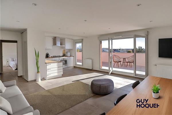 Appartement en attique 4 pièces de 91 m² avec double garage