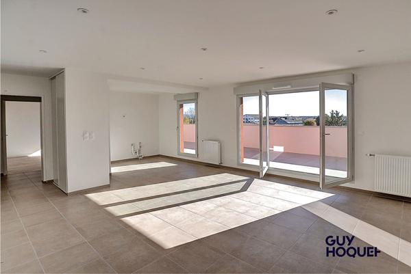 Appartement en attique 4 pièces de 91 m² avec double garage