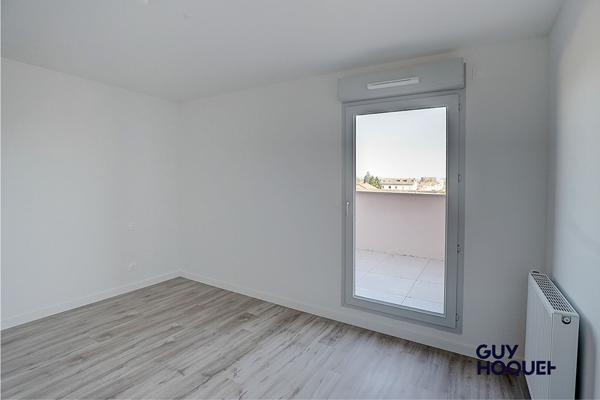 Appartement en attique 4 pièces de 91 m² avec double garage