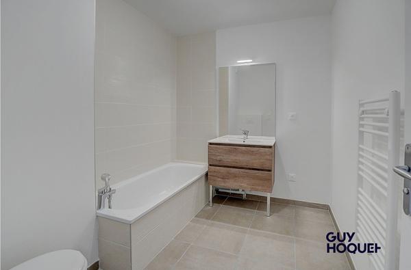 Appartement en attique 4 pièces de 91 m² avec double garage