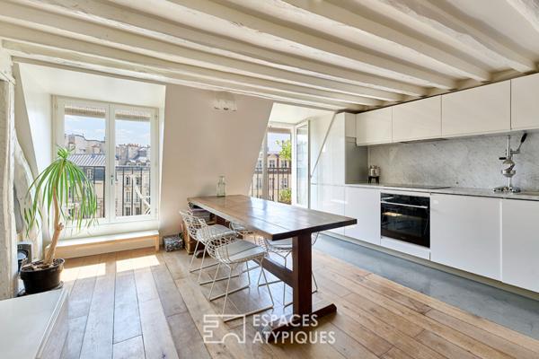 Duplex en dernier étage avec balcon – Île de la Cité