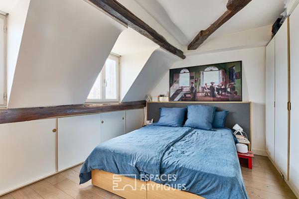 Duplex en dernier étage avec balcon – Île de la Cité