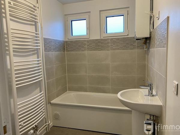 Appartement 4 pièces de 87,74 m² avec balcon, garage, cave et parking