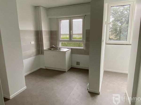 Appartement 4 pièces de 87,74 m² avec balcon, garage, cave et parking