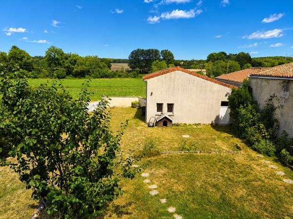 Maison T5 avec garage double et jardin