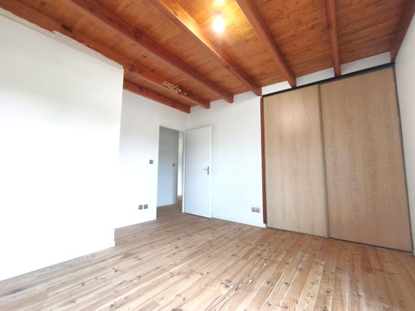 Maison T5 avec garage double et jardin
