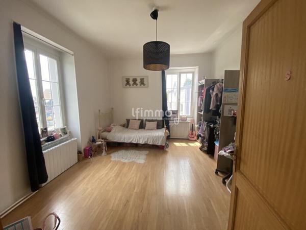 Immeuble de rapport 3 appartements et un local commercial à Illzach