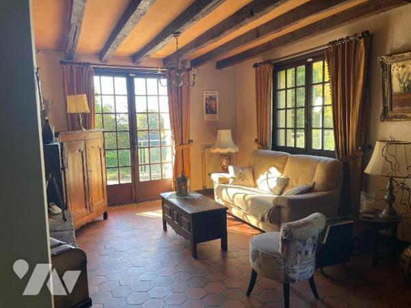 Maison de 140 m2 sur un terrain de 5459 m2 en centre ville de Domfront en poiraie