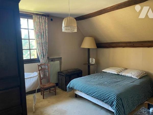 Maison de 140 m2 sur un terrain de 5459 m2 en centre ville de Domfront en poiraie