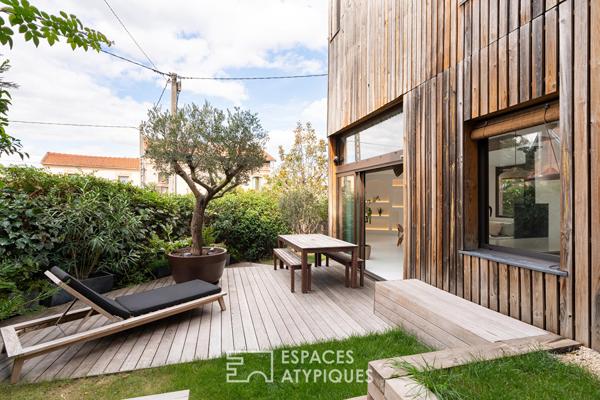 Maison contemporaine en ossature bois avec jardin et terrasse