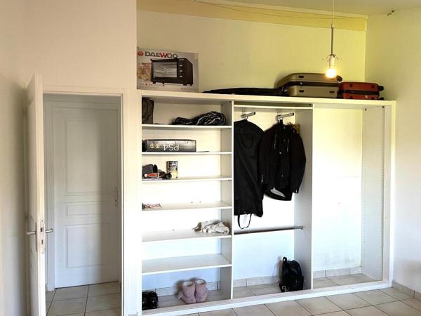 Super affaire : grands volumes, jardin privatif et trés bon rapport QP 149 500 €