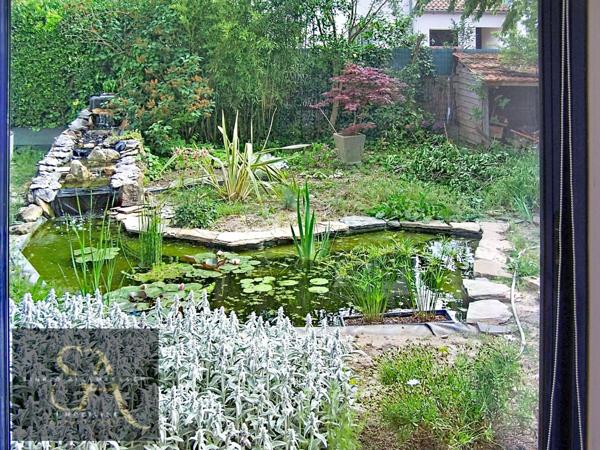 A vendre maison avec 3 chambres, un bureau, garage et jardin à Carcassonne proche des commodités.