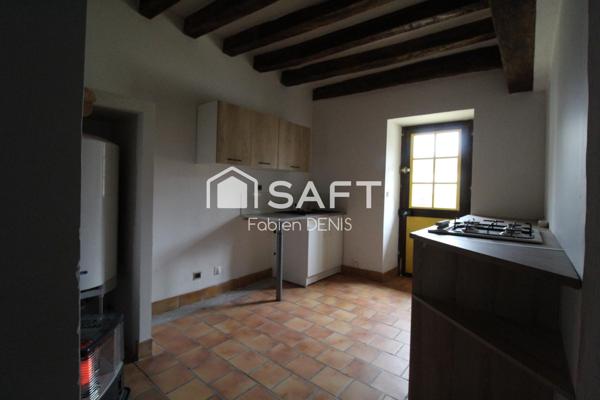 Ensemble de deux maisons et dépendances...