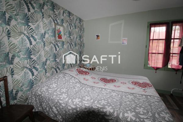 Ensemble de deux maisons et dépendances...