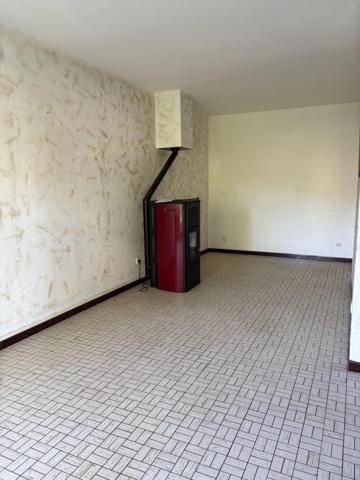Maison mitoyenne au fort potentiel