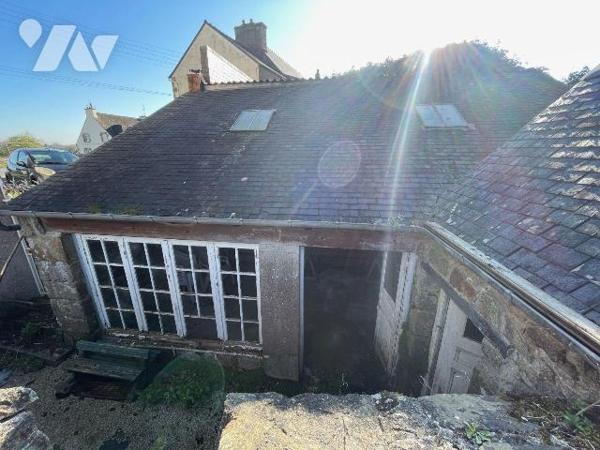Immeuble mixte, habitation et commerces à Vendre à Plouaret (22420) en Côtes-d'Armor (22)

Im...