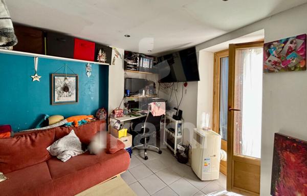 IMMEUBLE À USAGE COMMERCIAL 55 M2 - LOUÉ - CENTRE