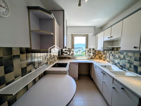 Appartement de type T3 situé proche des commodités, garage