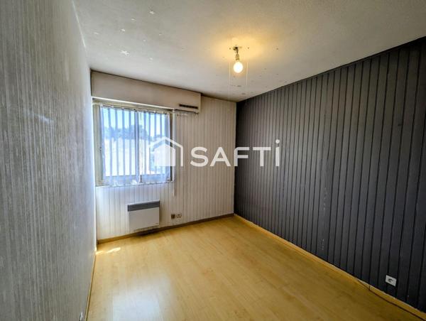 Appartement de type T3 situé proche des commodités, garage