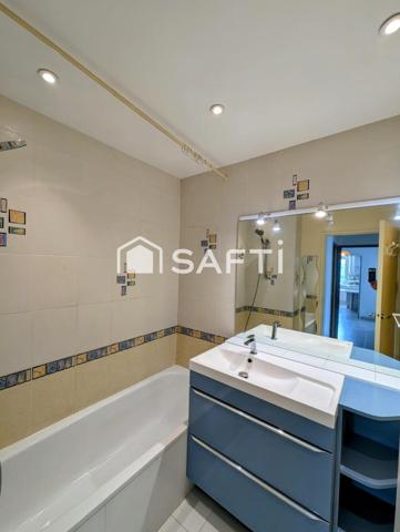 Appartement de type T3 situé proche des commodités, garage