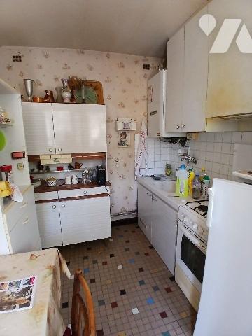 Maison de ville à restaurer avec garage