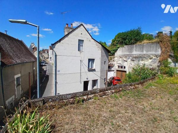 Maison de ville à restaurer avec garage