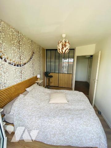 Vente LONGVIC appartement T3 de 68,59 m² avec 2 balcons et un garage