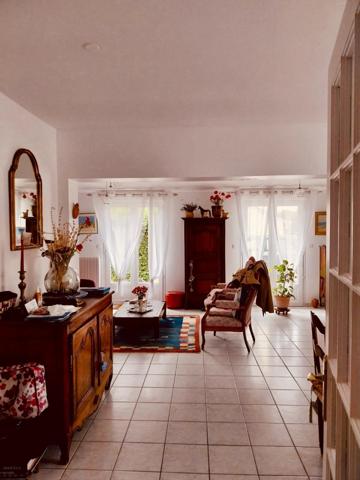 Maison au pied des commerces