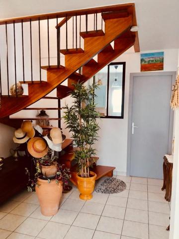 Maison au pied des commerces