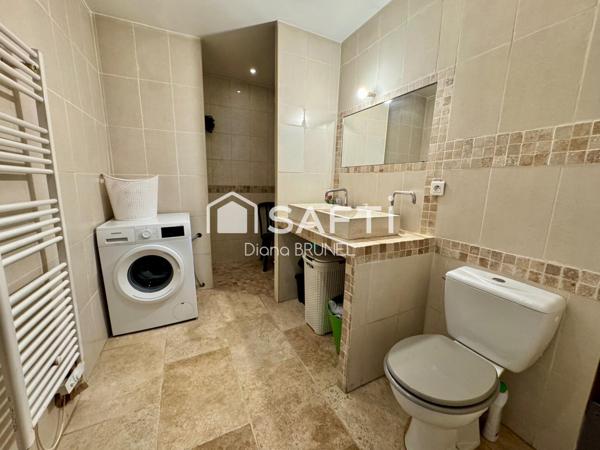 Immeuble comprenant local commercial et appart T4